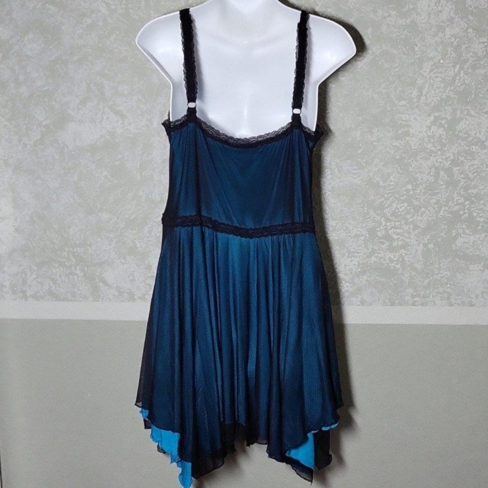 Chic Asymmetrical Teal Dress with Black Trim - Picture 6 of 9